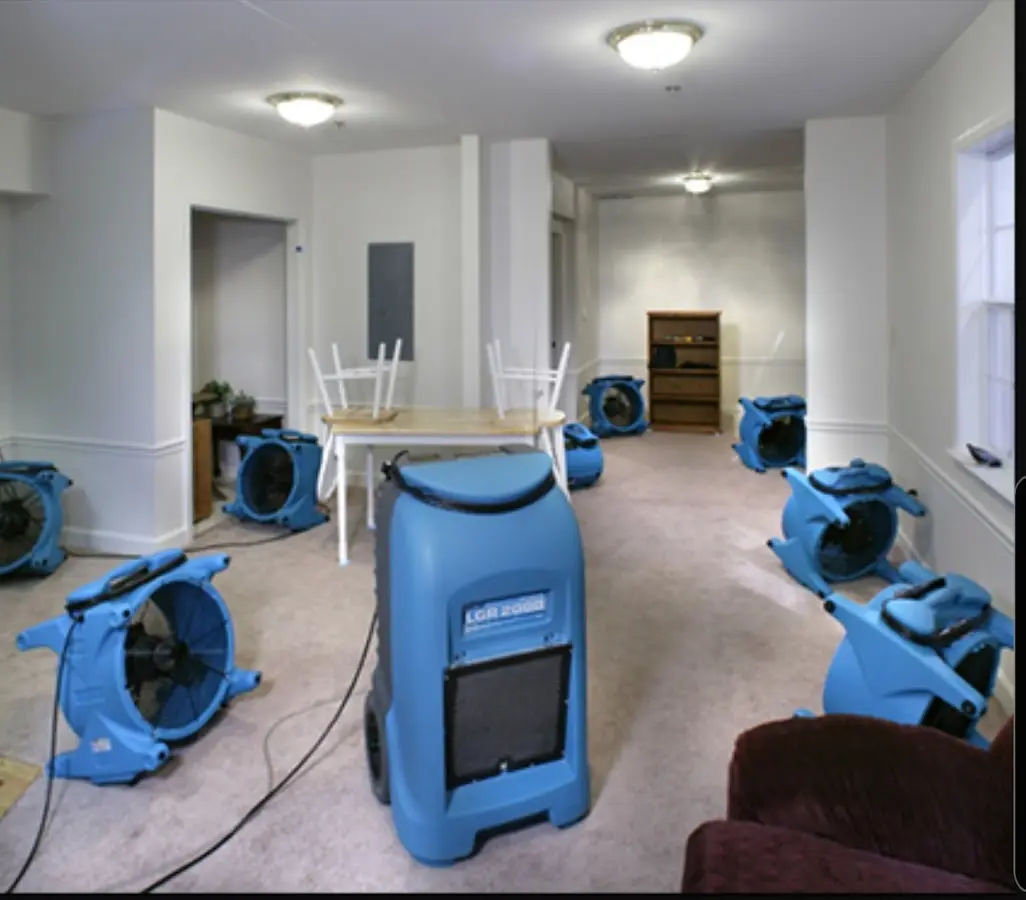 Air movers and dehumidifier setup for Water Damage Restoration in Excelsior Springs